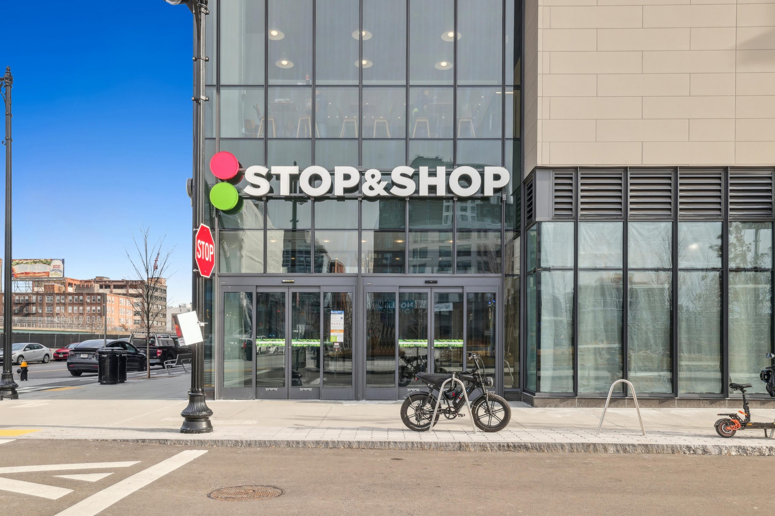 Alder_EXT_Neighborhood_Stop&ShopBuildingEntranceView_Shoootin_January2026