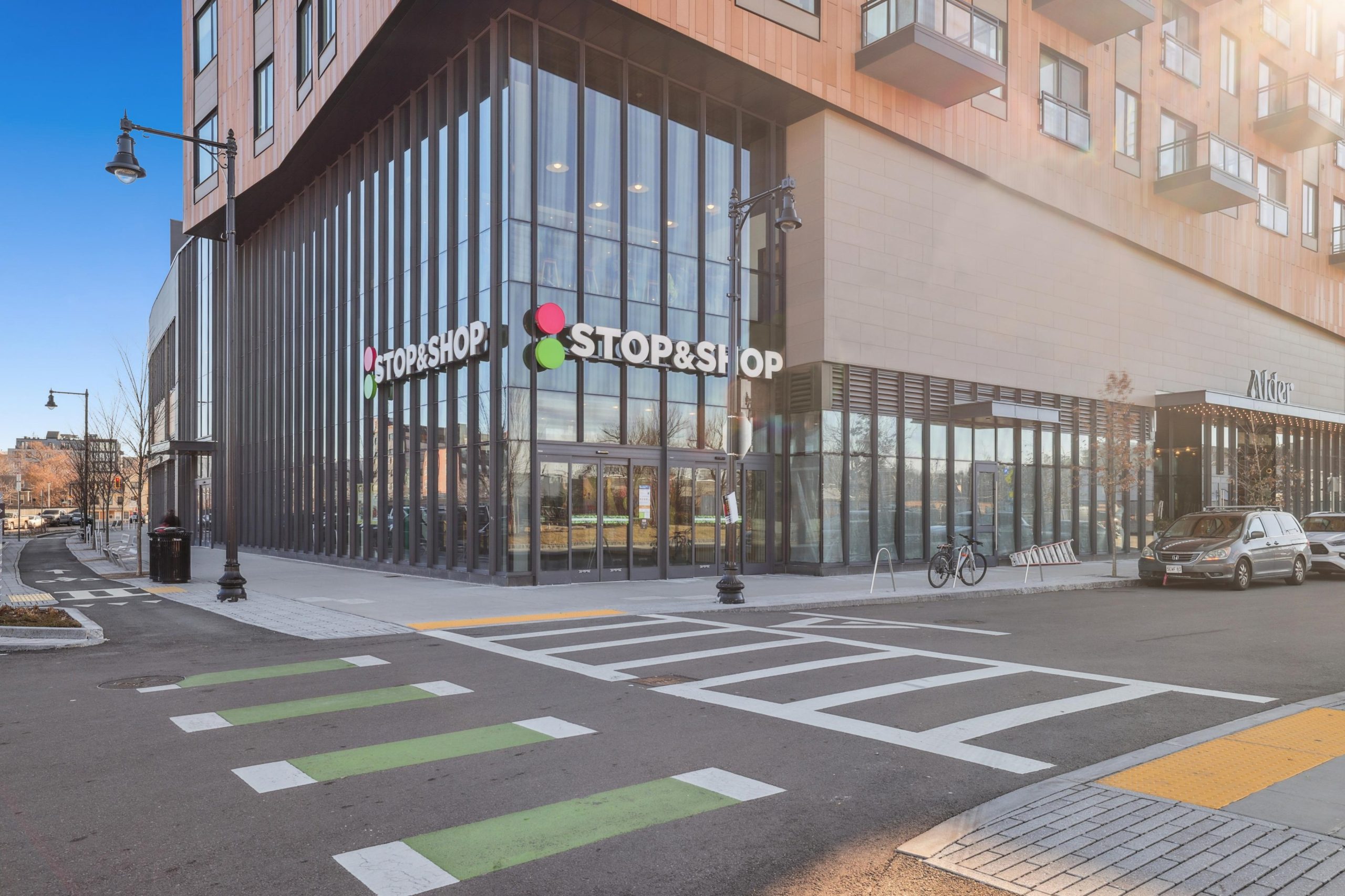Alder_EXT_Neighborhood_Stop&ShopCornerEntrance_Shoootin_January2026